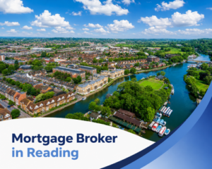 Bright summer aerial view of Reading with a winding blue river, riverside homes, apartment buildings, moored boats, green spaces and realistic white clouds, with branded blue and white graphics reading “Mortgage Broker in Reading”.