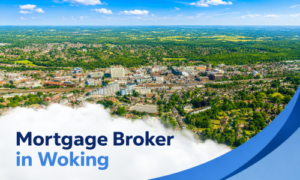 Promotional banner showing an aerial view of Woking on a bright summer’s day, with dense town buildings and surrounding greenery under a blue sky with realistic white clouds. A curved white panel overlays the lower left corner with the title “Mortgage Broker in Woking” in two branded blue tones, while layered blue graphic swooshes frame the right edge.