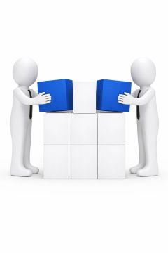 Two white humanoid figures working together to place blue blocks onto a white stacked cube structure, symbolising collaboration and building solutions, shown on a clean white background.