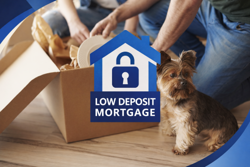 Small dog sitting on a wooden floor beside a cardboard moving box while two people unpack dishes in the background. A blue house graphic with a padlock icon and the words “Low Deposit Mortgage” is overlaid in the centre, using branded blue curved design elements in the corners.