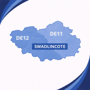 map in blue tones showing Swadlincote with postcode areas DE11 and DE12. The two postcode districts are divided by white internal boundaries and outlined with a darker blue outer edge, each labelled in white text. The word “Swadlincote” appears prominently across the centre of the map. The background features curved layered blue branding elements in the corners, with no surrounding towns or additional geographic detail shown.