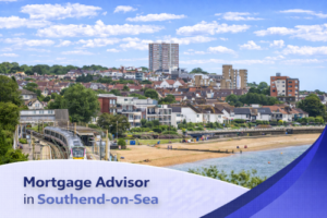 Bright summer coastal view of Southend-on-Sea featuring a train running along the seafront, sandy beach with people enjoying the shoreline, and a backdrop of residential buildings under a clear blue sky with natural, realistic clouds, with a clean promotional banner displaying “Mortgage Advisor in Southend-on-Sea.”