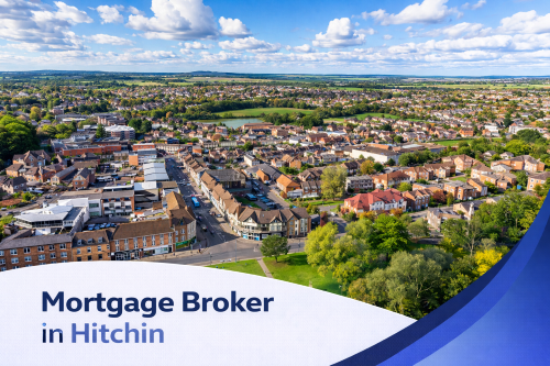 Bright, high-resolution aerial view of Hitchin on a clear summer day, featuring a vibrant town centre surrounded by greenery and residential areas under realistic blue skies with scattered clouds. A modern curved white and blue banner overlays the bottom of the image, displaying the text “Mortgage Broker in Hitchin” in clean, professional typography.