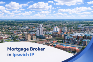 Mortgage broker in Ipswich IP promotional banner showing a bright summer aerial view of the town with riverside buildings, residential areas, and realistic clouds in a blue sky, with a curved blue and white graphic overlay at the bottom.
