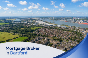 Bright summer aerial view of Dartford featuring residential neighbourhoods, green fields, and the River Thames with bridges and industrial areas in the distance, set under a clear blue sky with realistic scattered clouds, overlaid with a clean curved white and blue banner displaying the text “Mortgage Broker in Dartford”.
