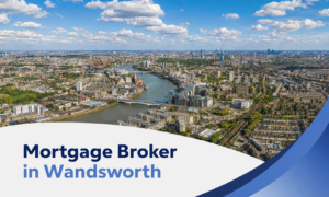 Promotional banner showing an aerial summer view of Wandsworth and the River Thames under bright blue skies with realistic fluffy clouds, with a white curved panel and blue branded swoosh accents at the bottom, and the title “Mortgage Broker in Wandsworth” in dark and light blue text.