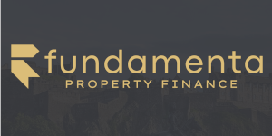 Fundamenta Property Finance logo displayed on a dark grey background, featuring a stylised gold geometric emblem to the left and the company name "Fundamenta Property Finance" in gold lettering. Subtle cityscape imagery appears faintly in the background, reinforcing the property finance theme. FP Finance Limited