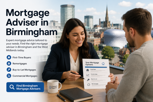 Mortgage adviser in Birmingham helping a client compare mortgage options with the Birmingham skyline in the background.