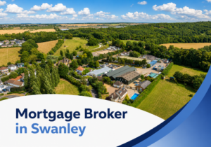 Promotional graphic for a mortgage broker in Swanley, featuring a bright summer aerial view of a leafy semi-rural area with homes, open fields, wooded areas, and scattered buildings under a vivid blue sky with large white clouds. A curved white panel overlays the bottom of the image with the title “Mortgage Broker in Swanley” in two shades of blue, alongside sweeping blue branded accents on the right.