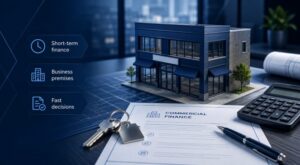 Bridging Loans for Business Premises with commercial property model, keys, finance documents and calculator.