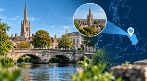 Mortgage Broker in Grantham hero image showing a scenic Grantham town view with a historic church spire, stone bridge over water, and a UK map with a location pin highlighting Grantham in Lincolnshire.