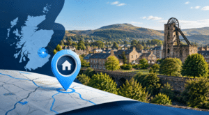Mortgage Broker in Newtongrange, Midlothian, represented by a location map pin, homes and a traditional stone bridge.