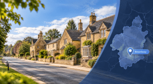 Mortgage Broker in Broadway hero image showing a traditional Cotswold-style street with honey-stone homes, landscaped gardens, and a branded map graphic with a Broadway location pin.