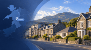 Mortgage Broker in Dolgellau hero image showing a map pin for Dolgellau, a street of stone homes and varied properties, with the surrounding Gwynedd mountain landscape in the background.